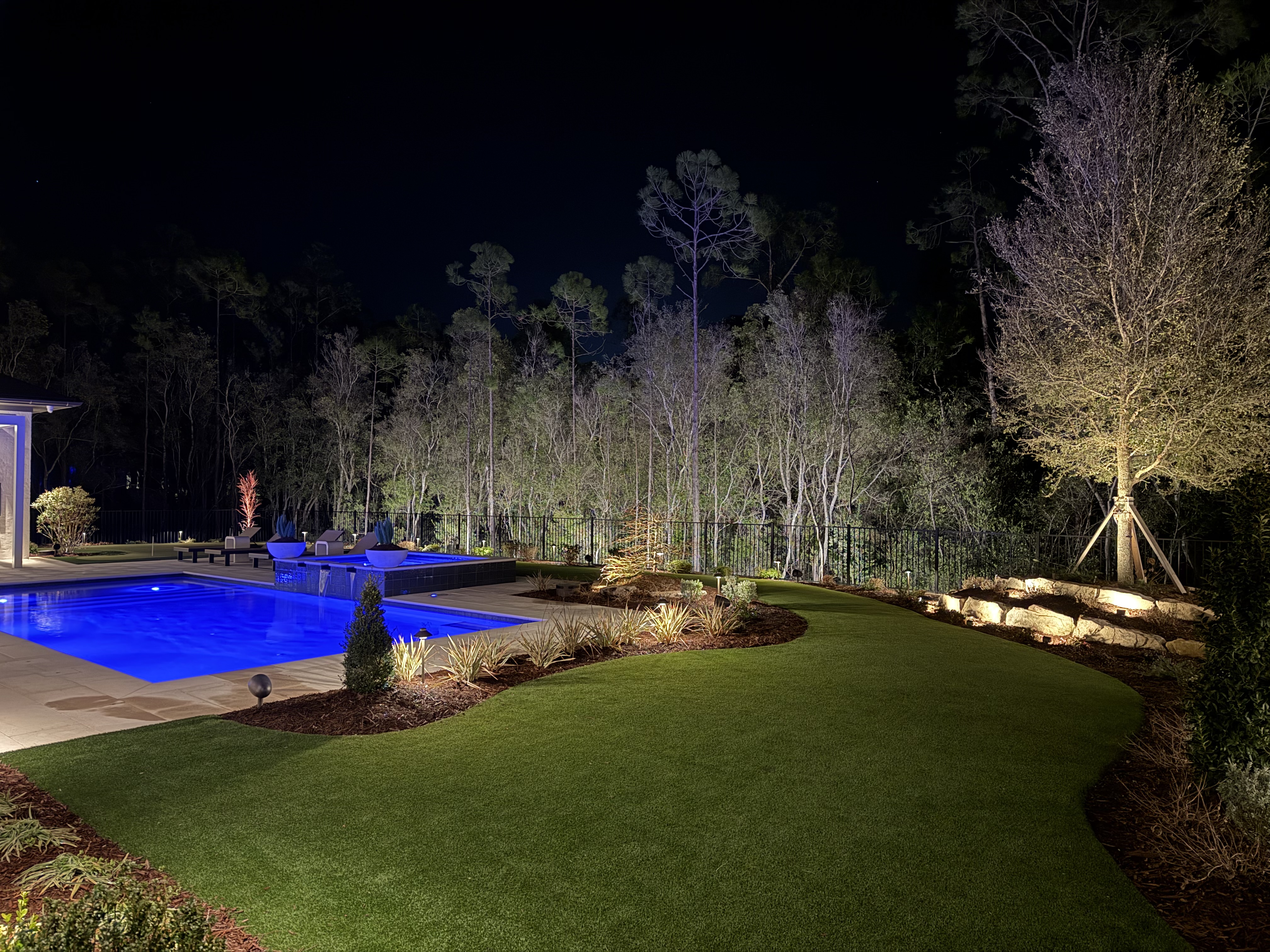 Outdoor dining area under string lights