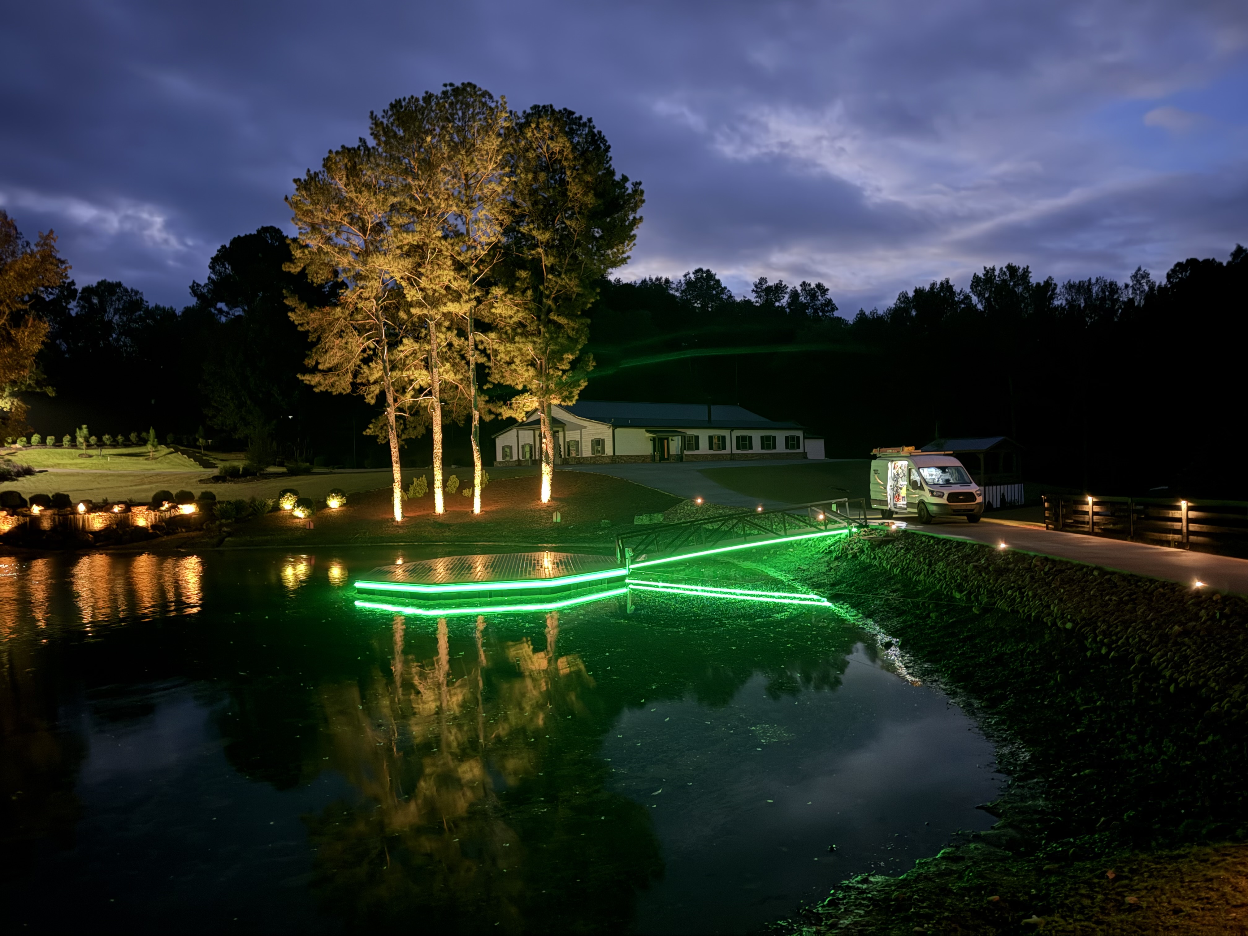 Stone patio with soft ground-level lighting